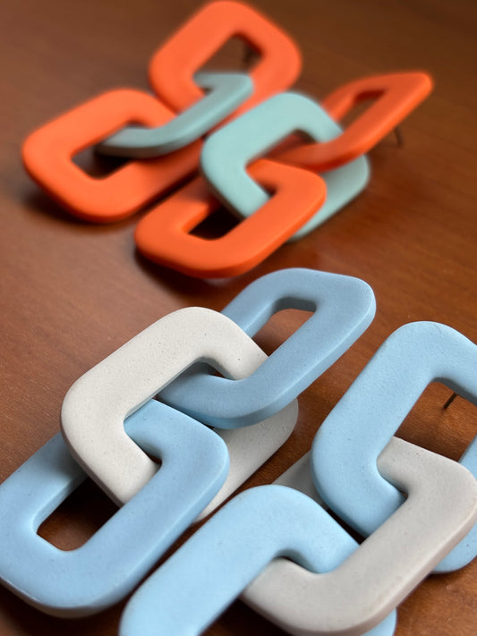 Cadena ooo naranja y azul claro